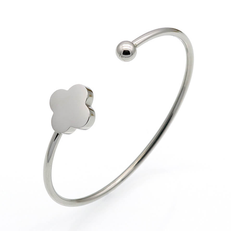 Jonc décoratif avec trèfle porte-bonheur, résistant à l’eau. Ajoutez une touche d’originalité et de chance à votre style quotidien.