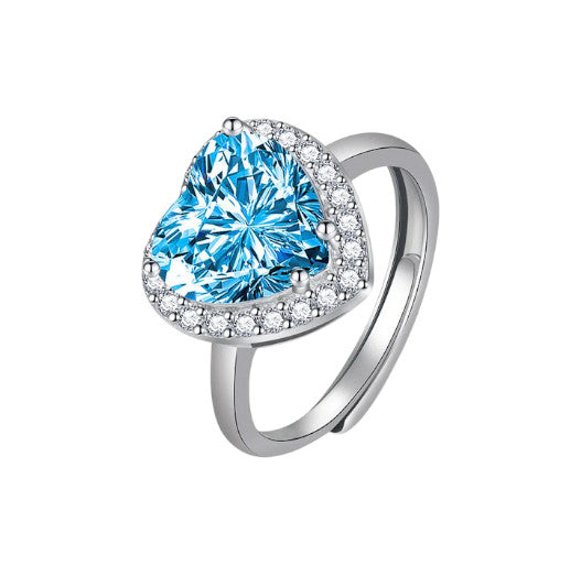 Bague Azuria en acier inoxydable argenté, ornée d’un cristal bleu éclatant en forme de cœur. Un bijou élégant, durable et lumineux pour sublimer chaque instant.