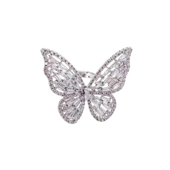 Optez pour Lyséa, la bague papillon en acier inoxydable ajustable en alliage, sertie de cristaux étincelants. Élégance, confort et style contemporain.