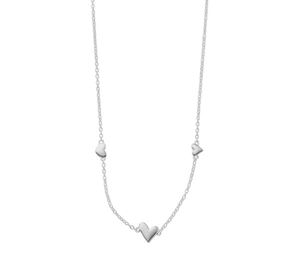 Collier Mia en acier inoxydable avec petits cœurs. Chaîne réglable, résistant à l’eau. Élégant, délicat et parfait pour toutes les occasions.