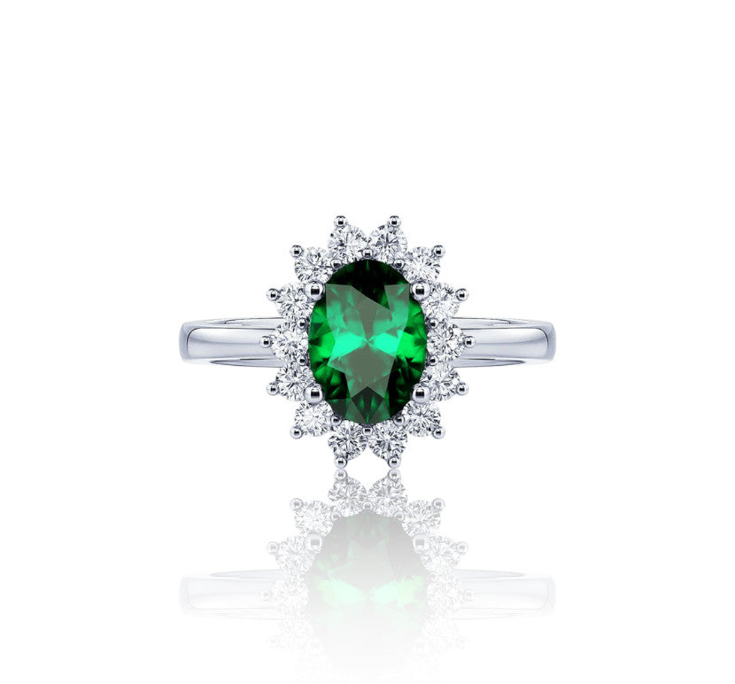 Bague Elizabeth avec tourmaline verte et zircons étincelants. Symbolise force et courage. Durable, élégante et résistante à l’eau. Guide des tailles inclus.