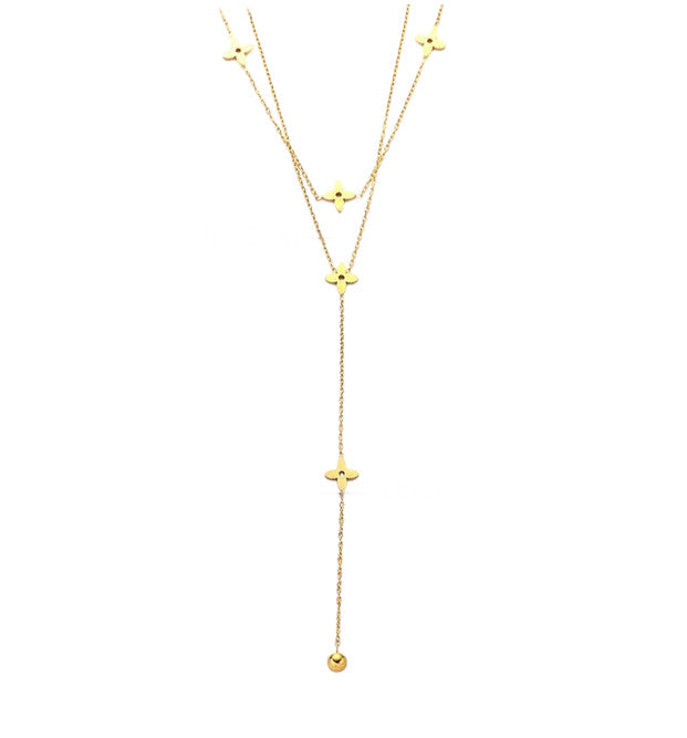Collier Héra à double chaîne dorée ou argentée en acier inoxydable avec croix. Élégant, résistant à l’eau, parfait pour un look raffiné.