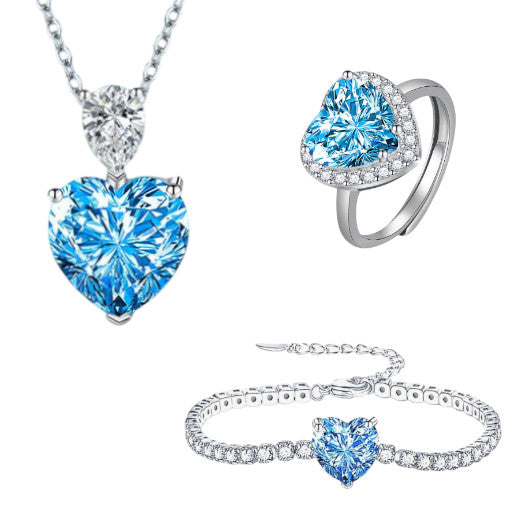 Parure Azuria en acier inoxydable, orné d’un cristal bleu éclatant en forme de cœur. Un bijou élégant, durable et lumineux pour sublimer chaque moment.
