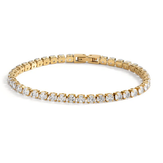 Bracelet tennis Alma en acier inoxydable doré, orné de zircons ovales : chic, élégant et parfait pour sublimer toutes vos tenues.