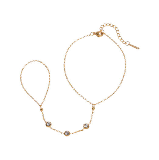 Chaine de main Elio en acier inoxydable doré 18K, design géométrique moderne. Élégant, résistant à l’eau et hypoallergénique, parfait pour un style chic.