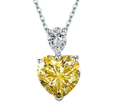 Collier Soléa en acier inoxydable, orné d’un cristal jaune éclatant en forme de cœur. Un bijou durable, élégant et lumineux pour illuminer chaque moment.